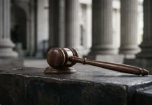 Pakistan Military Warns of Decisive Force Ahead of October 4 Political March A conceptual image representing military law and authority with a gavel on a metallic surface.